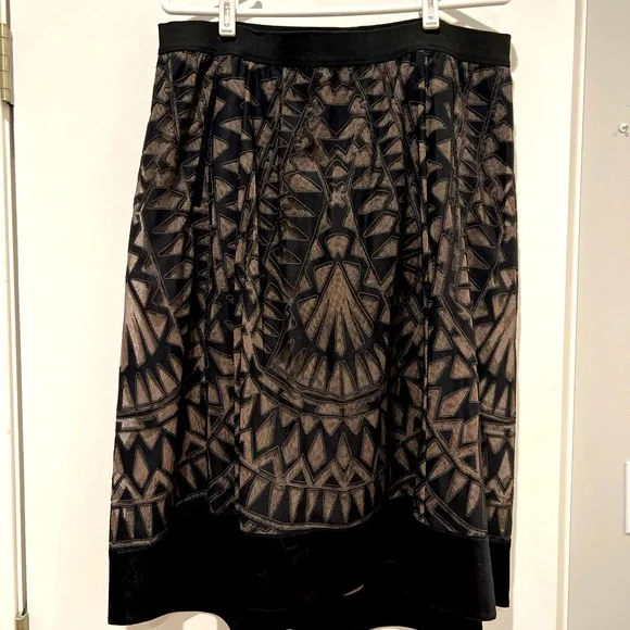 BCBG hi-low a-line skirt with sheer designed overlay over black short shorts